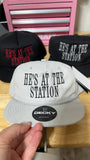 HE’S AT THE STATION